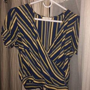 Wrap shirt. Able to tie however you’d like.